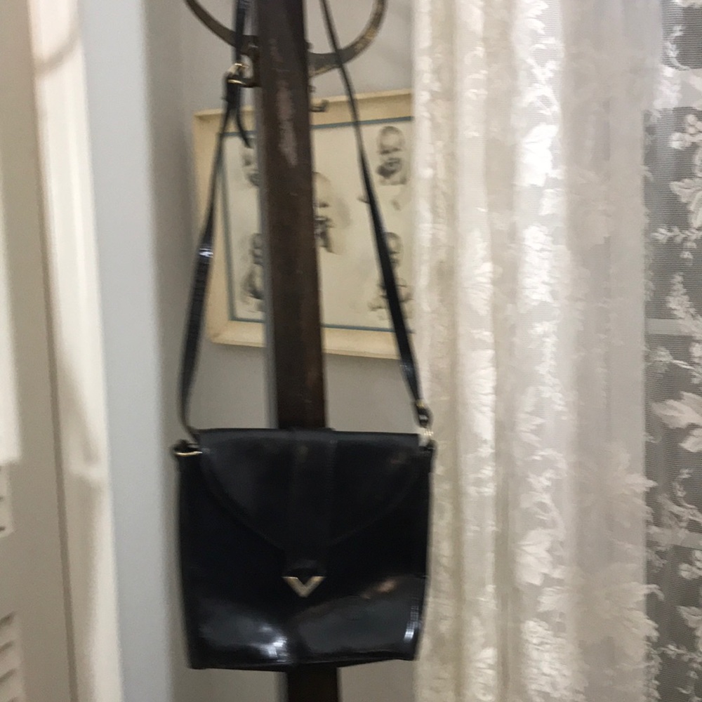 Pelletterie Tris handbag. Leather. Made in Italy.
